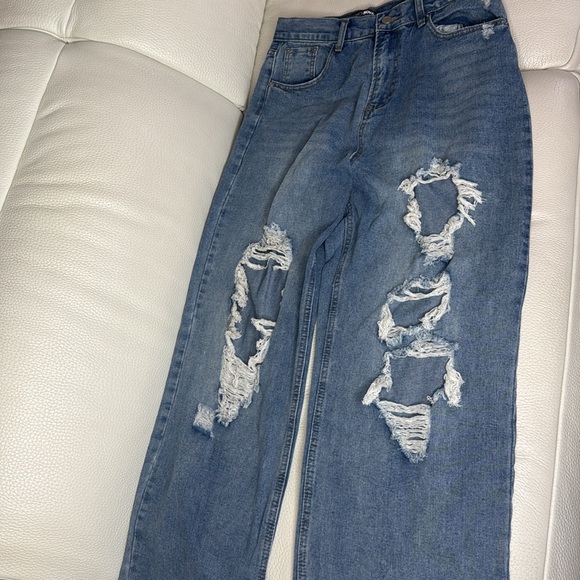 Size 11. Fashion Nova medium wash distressed boyfriend jeans. - Picture 2 of 4